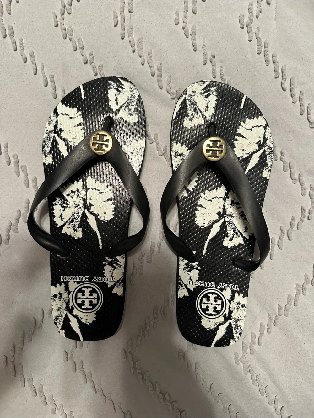 Tory Burch Black and White Floral Logo Flip Flops